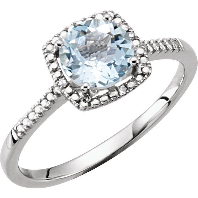 Natural aquamarine and diamond halo ring in sterling silver