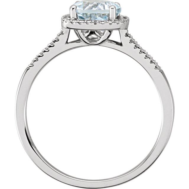 Side view of natural aquamarine halo ring