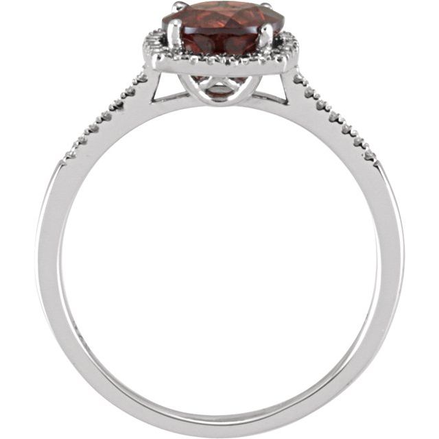 Side view of natural Mozambique garnet halo ring