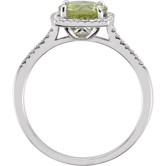 Side view of natural peridot halo ring