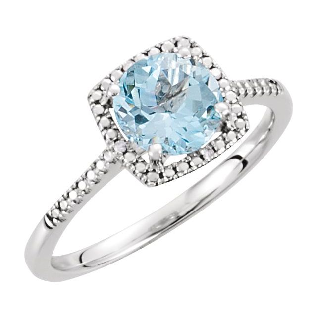 Natural sky blue topaz and diamond halo ring in sterling silver